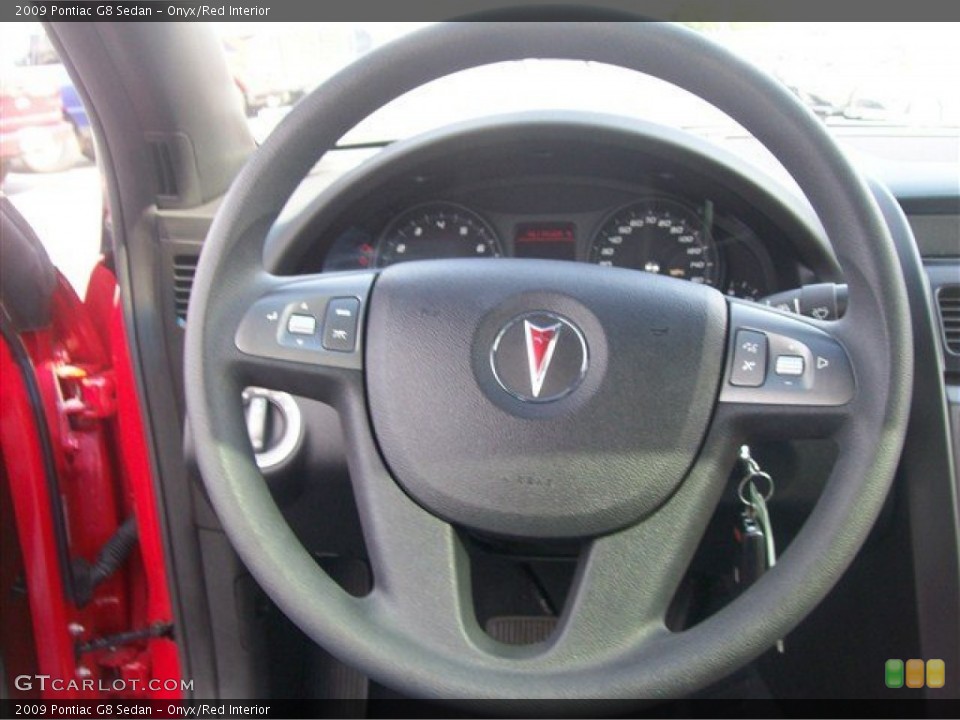 Onyx/Red Interior Steering Wheel for the 2009 Pontiac G8 Sedan #63261436