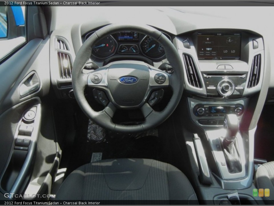Charcoal Black Interior Dashboard for the 2012 Ford Focus Titanium Sedan #63394035