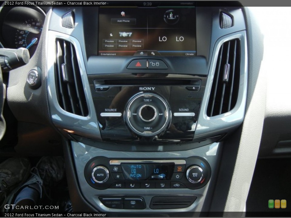 Charcoal Black Interior Controls for the 2012 Ford Focus Titanium Sedan #63394051