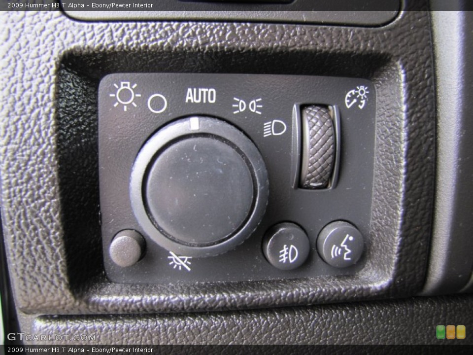 Ebony/Pewter Interior Controls for the 2009 Hummer H3 T Alpha #63462757