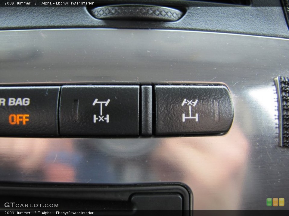Ebony/Pewter Interior Controls for the 2009 Hummer H3 T Alpha #63462808