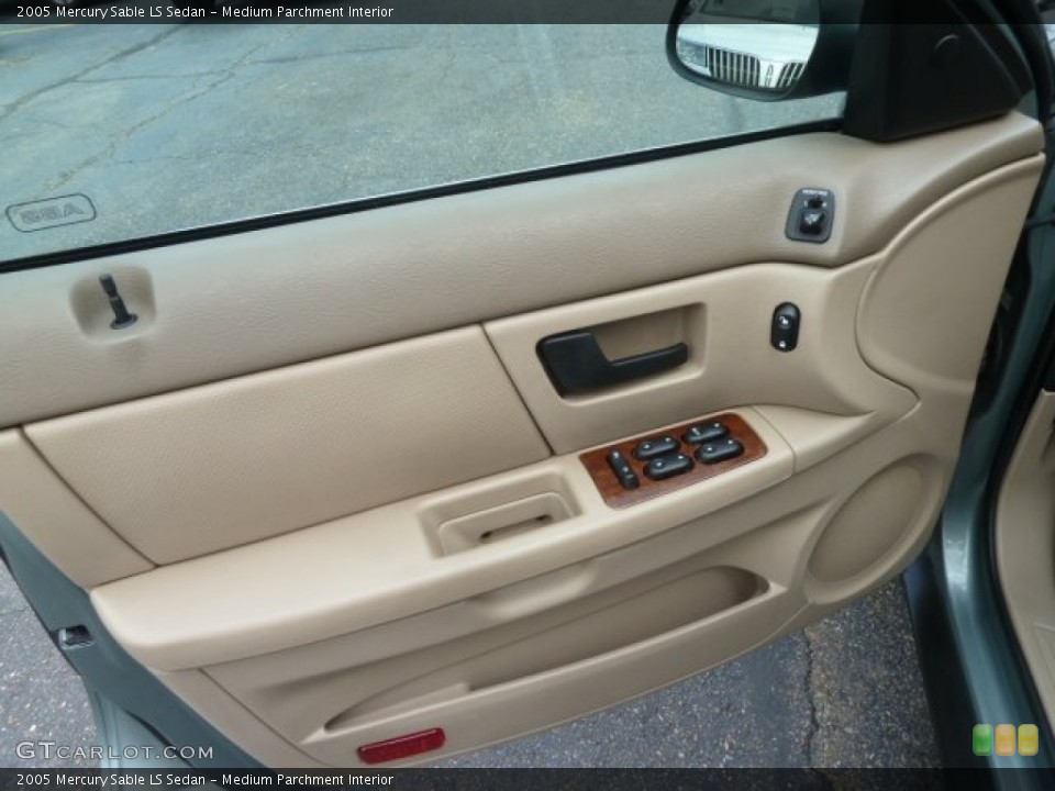 Medium Parchment Interior Door Panel for the 2005 Mercury Sable LS Sedan #63592330