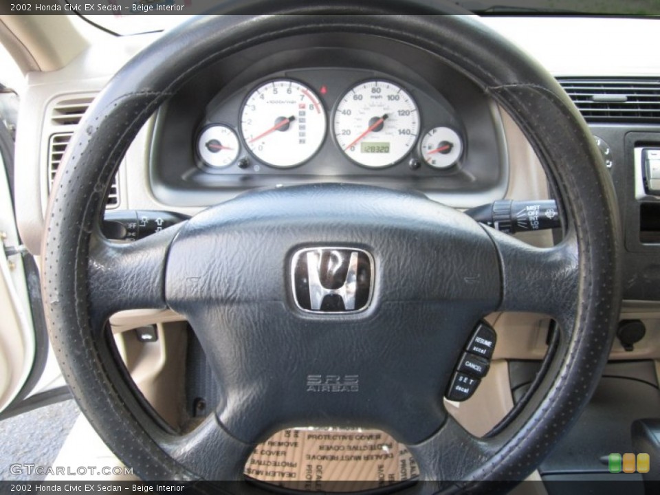 Beige Interior Steering Wheel for the 2002 Honda Civic EX Sedan #63614864