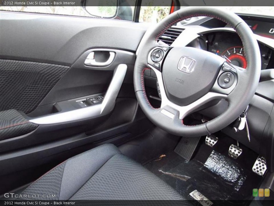 Black Interior Steering Wheel for the 2012 Honda Civic Si Coupe #63642790