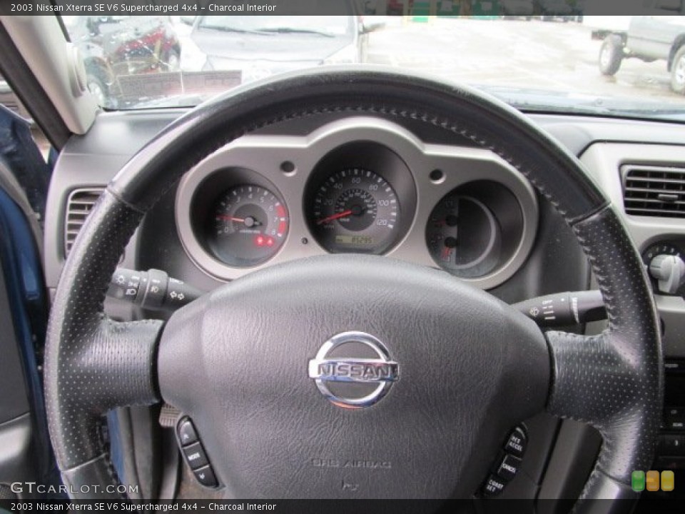 Charcoal Interior Steering Wheel for the 2003 Nissan Xterra SE V6 Supercharged 4x4 #63672797