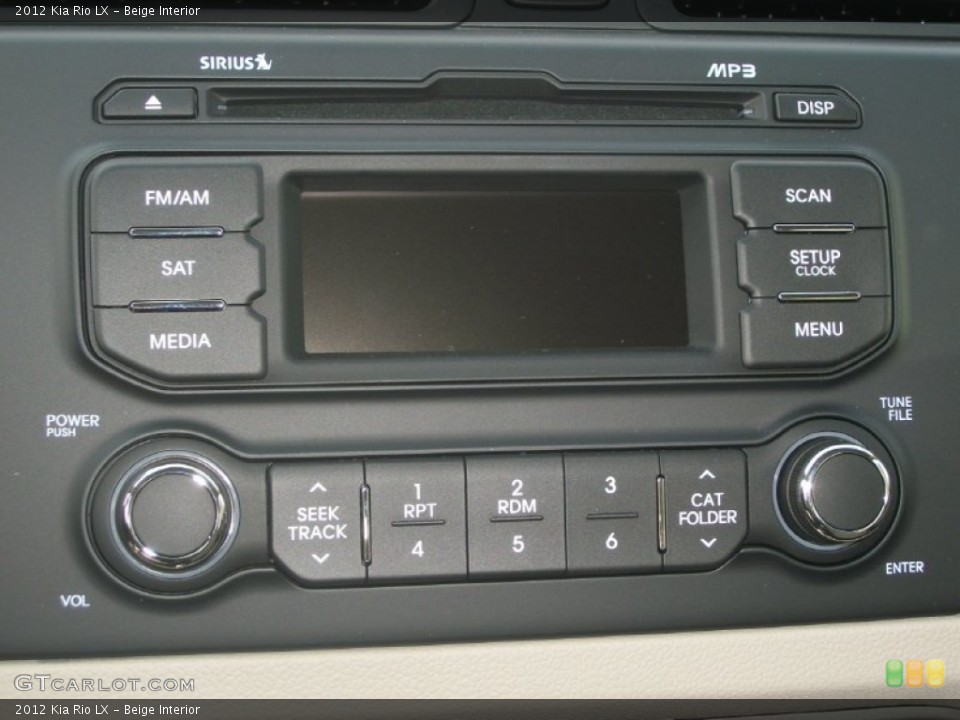 Beige Interior Audio System for the 2012 Kia Rio LX #63689178