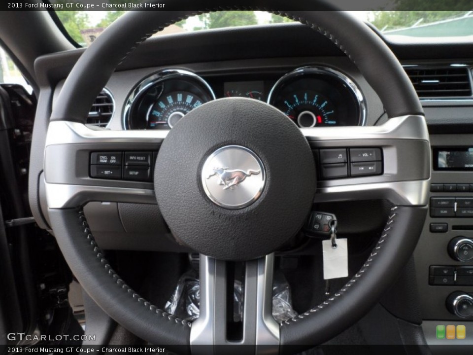 Charcoal Black Interior Steering Wheel for the 2013 Ford Mustang GT Coupe #63714568