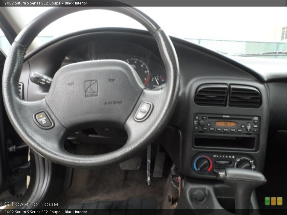 Black Interior Dashboard for the 2002 Saturn S Series SC2 Coupe #63763649