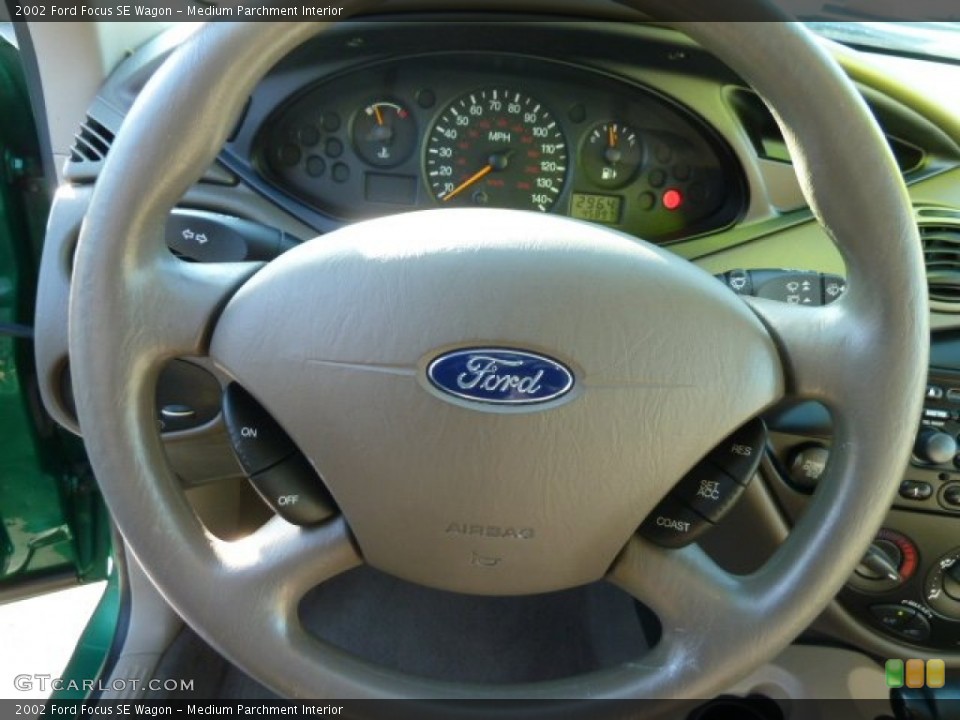 Medium Parchment Interior Steering Wheel for the 2002 Ford Focus SE Wagon #63776122