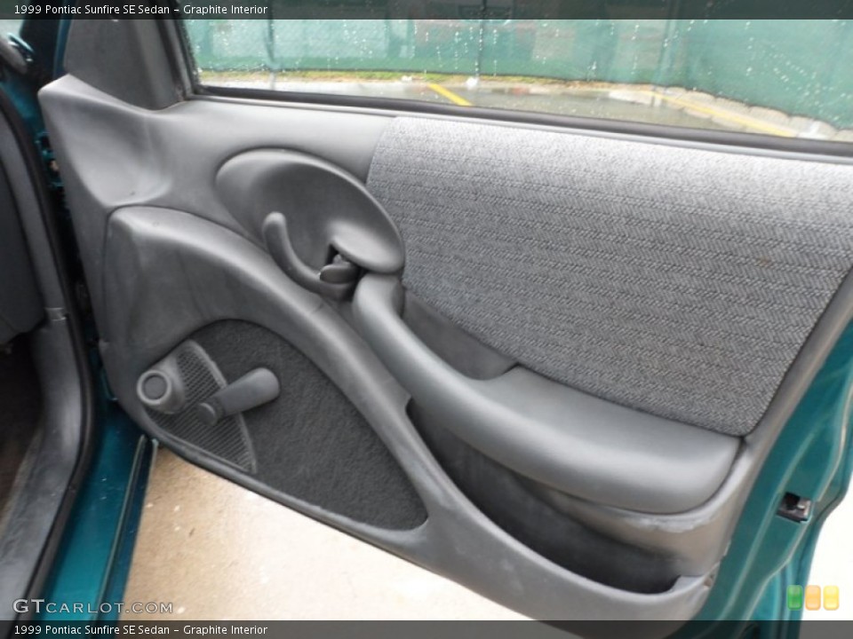 Graphite Interior Door Panel for the 1999 Pontiac Sunfire SE Sedan #63900409