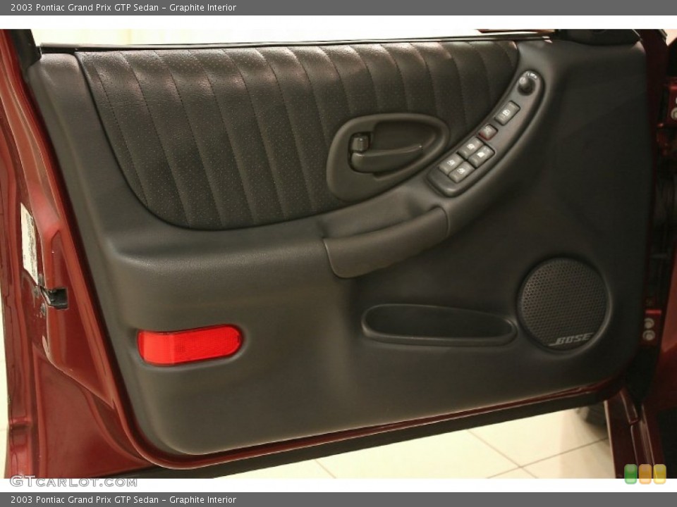 Graphite Interior Door Panel for the 2003 Pontiac Grand Prix GTP Sedan #63968388