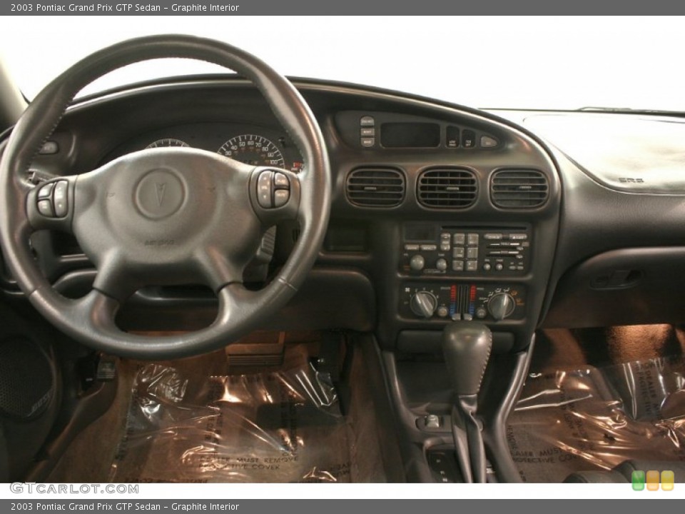 Graphite Interior Dashboard for the 2003 Pontiac Grand Prix GTP Sedan #63968462