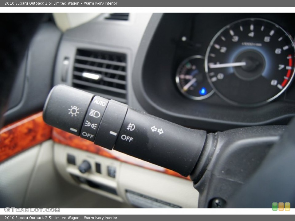 Warm Ivory Interior Controls for the 2010 Subaru Outback 2.5i Limited Wagon #64029727