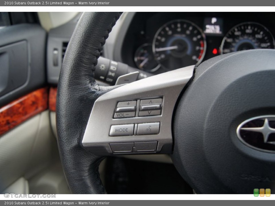 Warm Ivory Interior Controls for the 2010 Subaru Outback 2.5i Limited Wagon #64029733