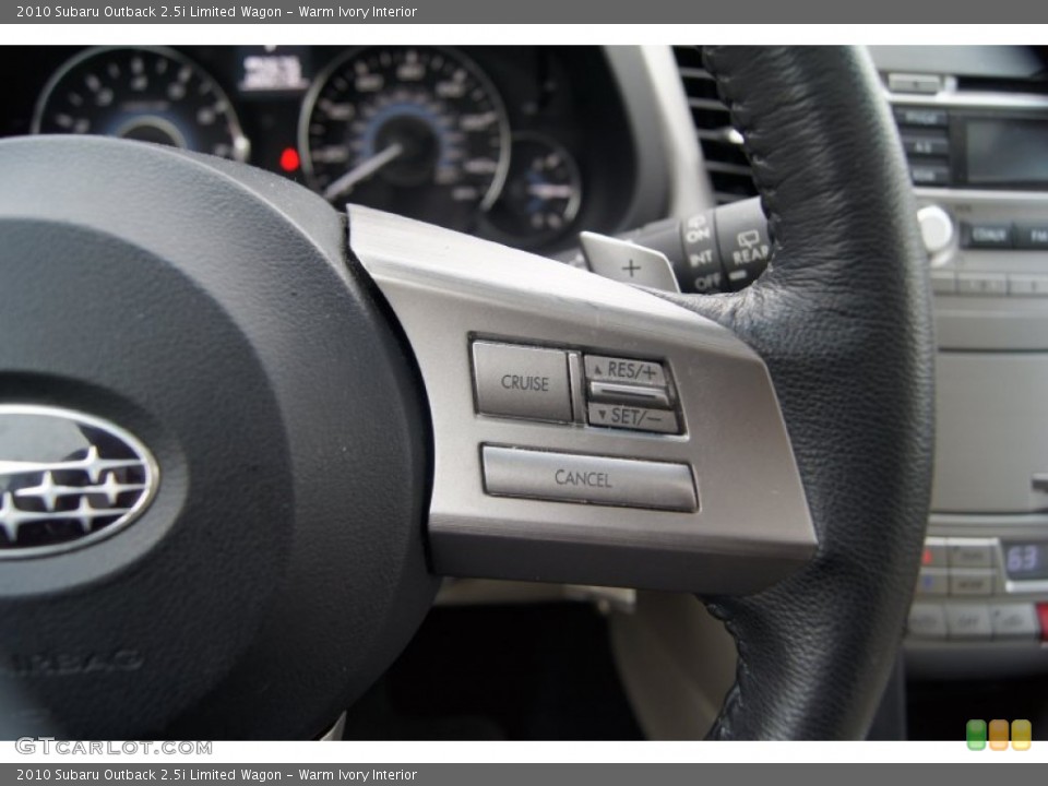 Warm Ivory Interior Controls for the 2010 Subaru Outback 2.5i Limited Wagon #64029739