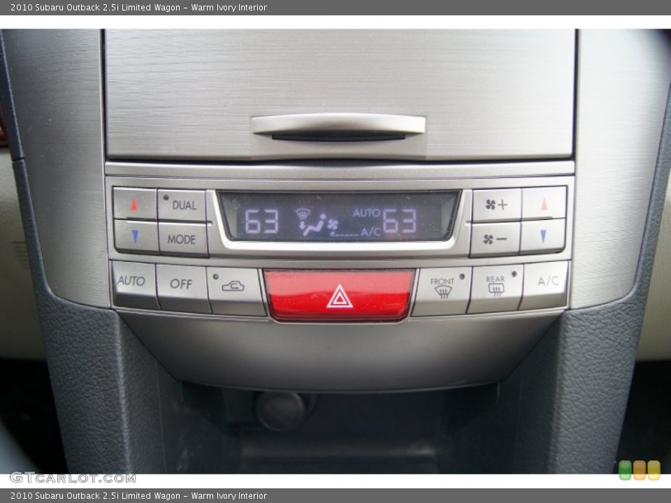 Warm Ivory Interior Controls for the 2010 Subaru Outback 2.5i Limited Wagon #64029763