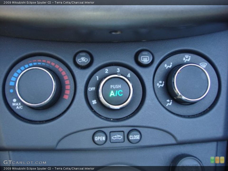 Terra Cotta/Charcoal Interior Controls for the 2009 Mitsubishi Eclipse Spyder GS #64031722