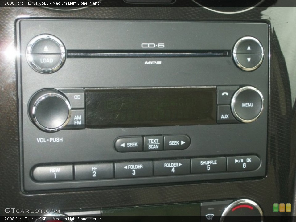 Medium Light Stone Interior Audio System for the 2008 Ford Taurus X SEL #64062139