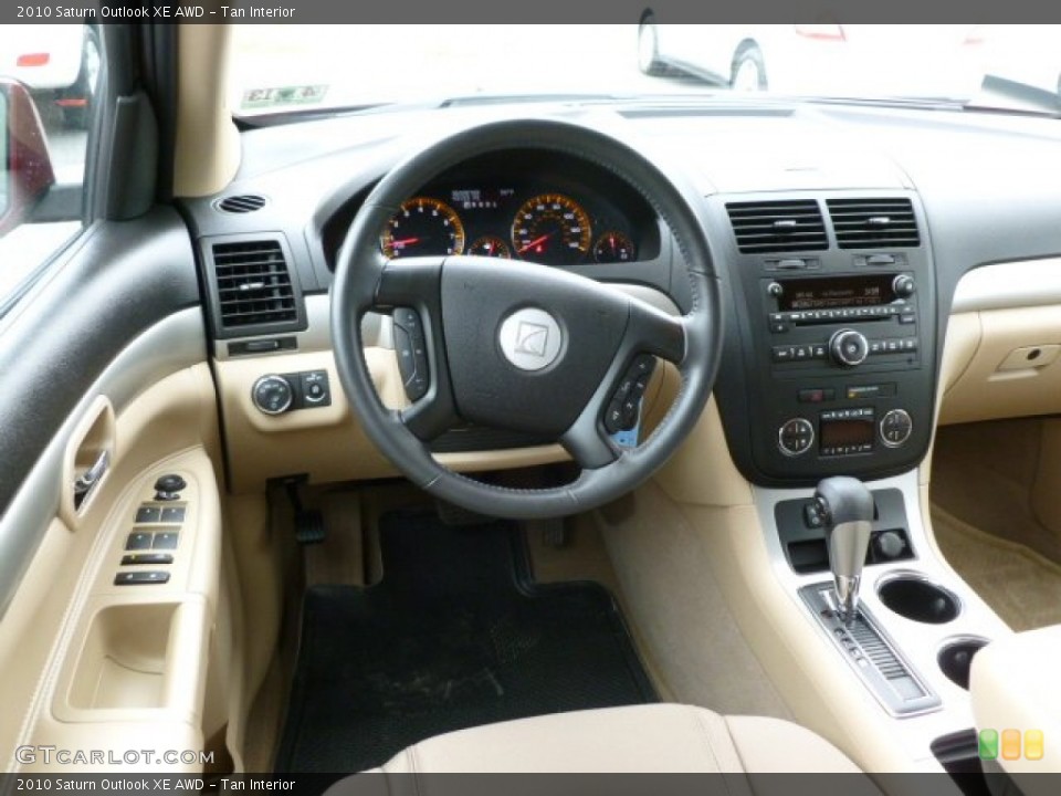 Tan Interior Dashboard for the 2010 Saturn Outlook XE AWD #64077400