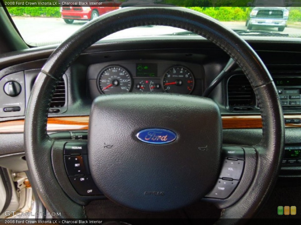 Charcoal Black Interior Steering Wheel for the 2008 Ford Crown Victoria LX #64144549