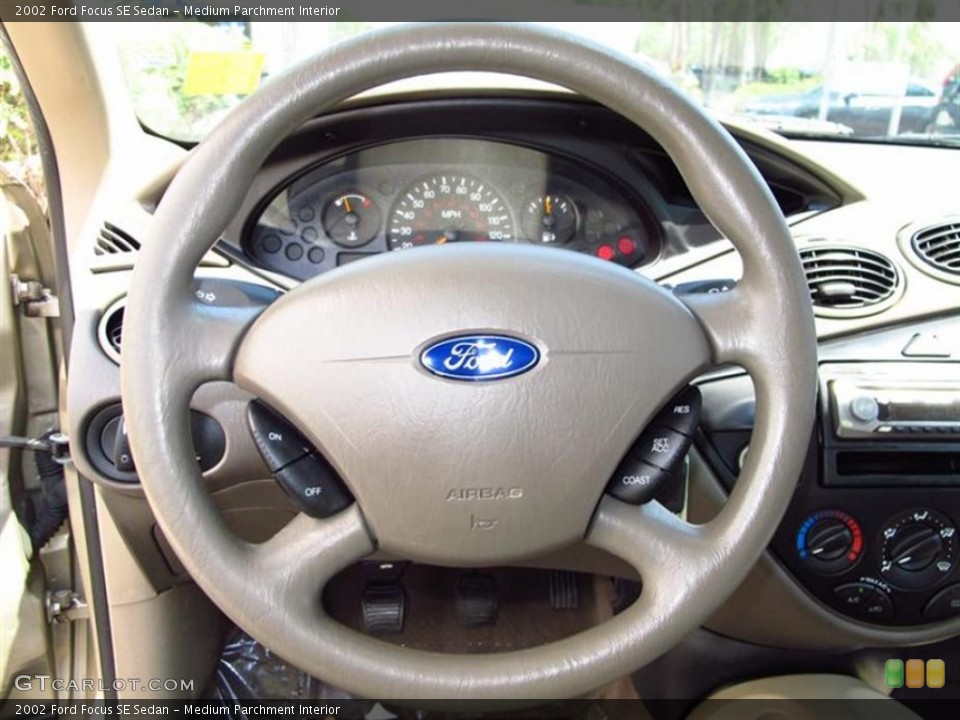 Medium Parchment Interior Steering Wheel for the 2002 Ford Focus SE Sedan #64185850