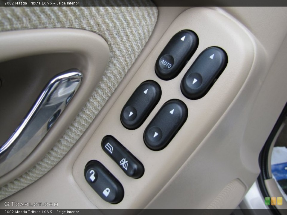 Beige Interior Controls for the 2002 Mazda Tribute LX V6 #64196056
