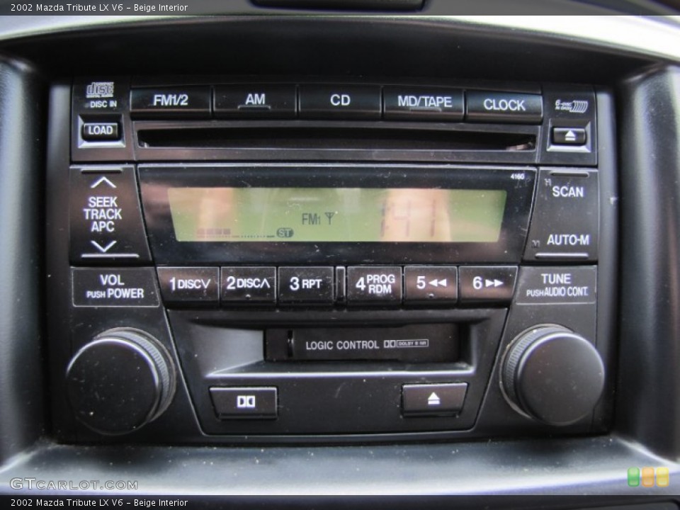 Beige Interior Controls for the 2002 Mazda Tribute LX V6 #64196090