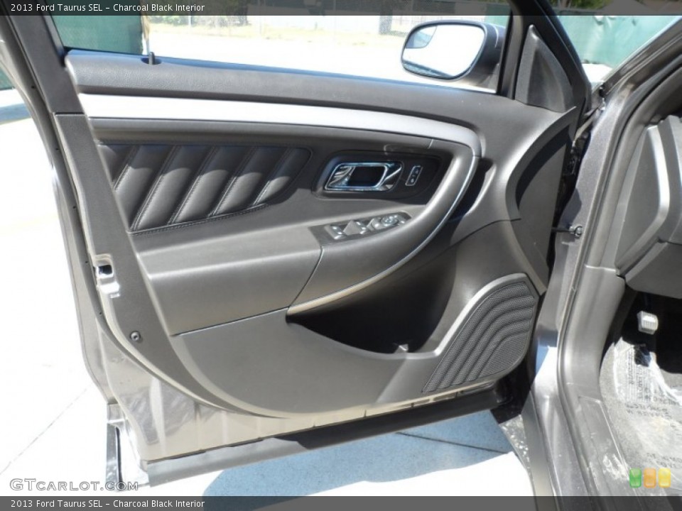 Charcoal Black Interior Door Panel for the 2013 Ford Taurus SEL #64279127