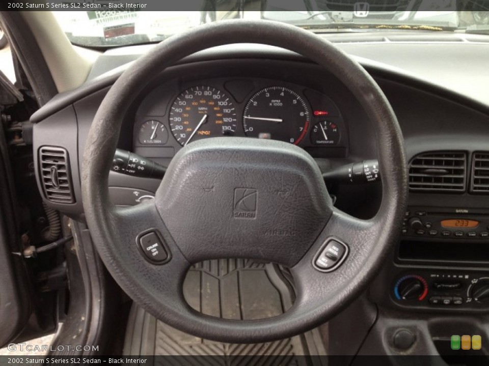 Black Interior Steering Wheel for the 2002 Saturn S Series SL2 Sedan #64370068