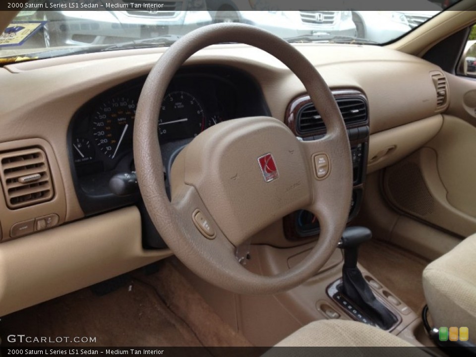 Medium Tan Interior Steering Wheel for the 2000 Saturn L Series LS1 Sedan #64371179