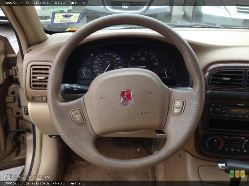 Medium Tan Interior Steering Wheel for the 2000 Saturn L Series LS1 Sedan #64371189