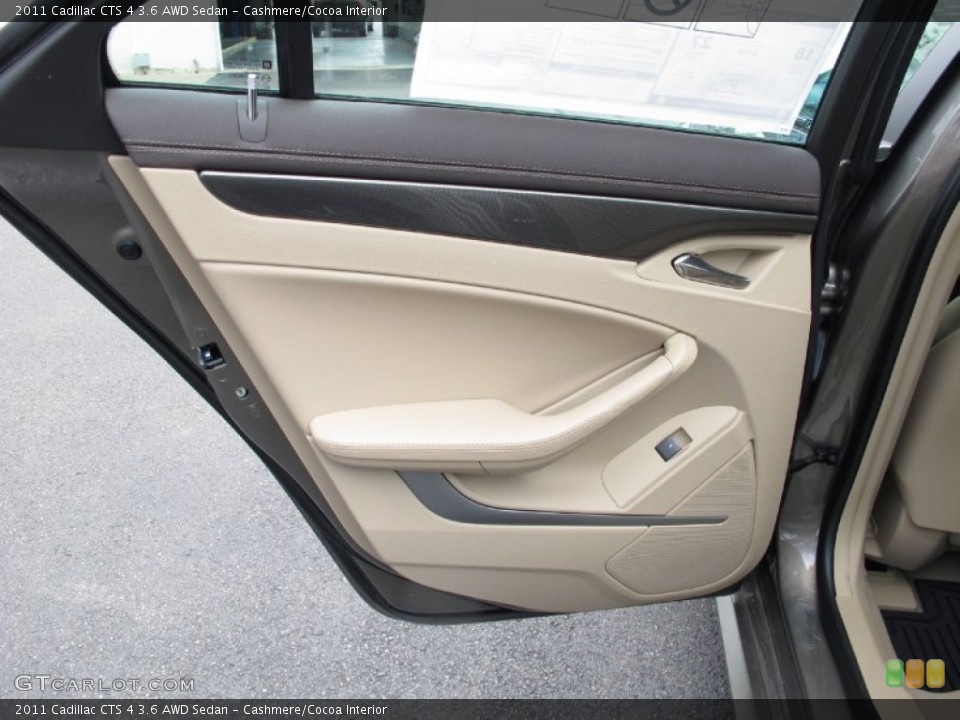 Cashmere/Cocoa Interior Door Panel for the 2011 Cadillac CTS 4 3.6 AWD Sedan #64382856