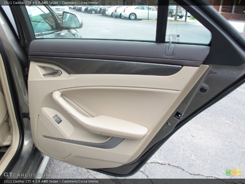 Cashmere/Cocoa Interior Door Panel for the 2011 Cadillac CTS 4 3.6 AWD Sedan #64382874