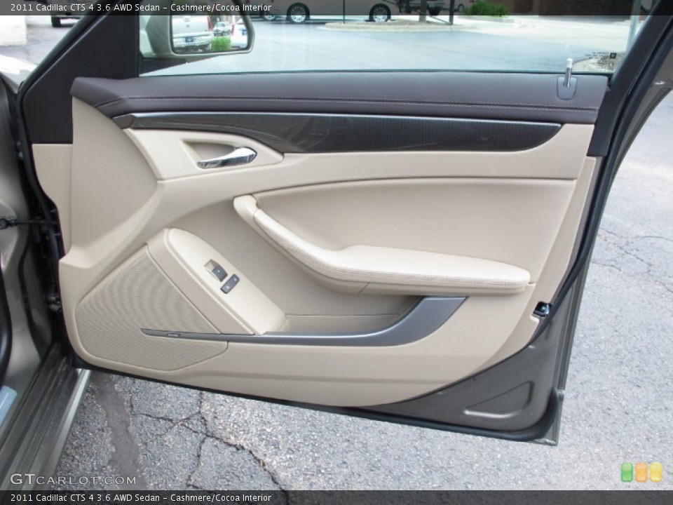 Cashmere/Cocoa Interior Door Panel for the 2011 Cadillac CTS 4 3.6 AWD Sedan #64382892