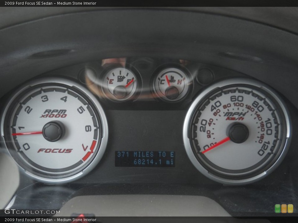 Medium Stone Interior Gauges for the 2009 Ford Focus SE Sedan #64587090