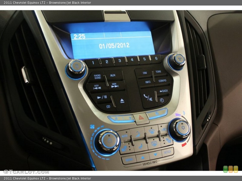 Brownstone/Jet Black Interior Controls for the 2011 Chevrolet Equinox LTZ #64603941