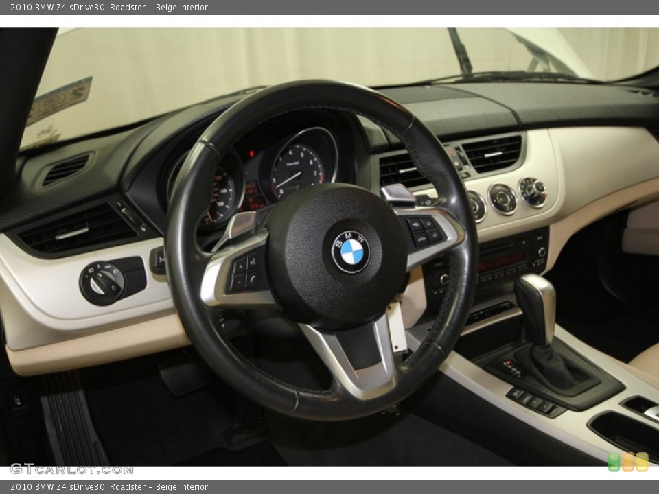 Beige Interior Dashboard for the 2010 BMW Z4 sDrive30i Roadster #64621550