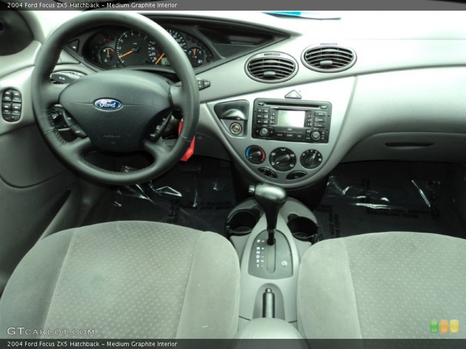 Medium Graphite Interior Dashboard for the 2004 Ford Focus ZX5 Hatchback #64631698