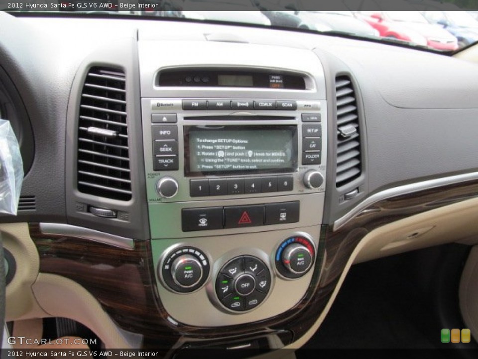 Beige Interior Controls for the 2012 Hyundai Santa Fe GLS V6 AWD #64779789