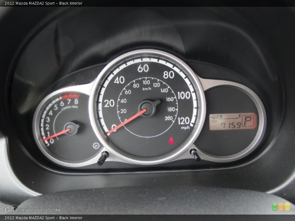 Black Interior Gauges for the 2012 Mazda MAZDA2 Sport #64796547