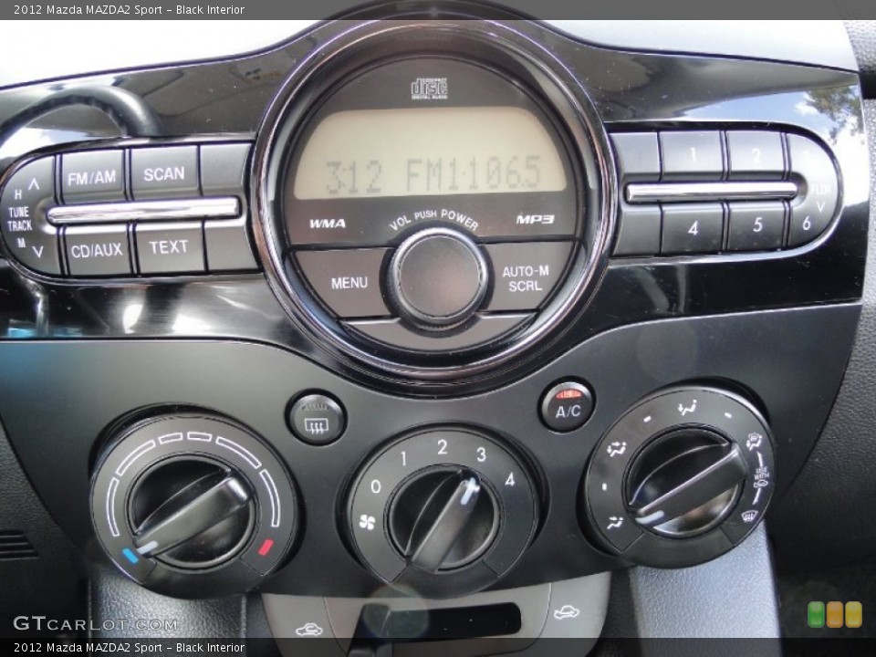Black Interior Controls for the 2012 Mazda MAZDA2 Sport #64796571