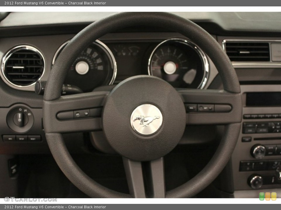Charcoal Black Interior Steering Wheel for the 2012 Ford Mustang V6 Convertible #64808860