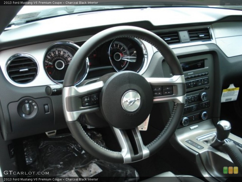 Charcoal Black Interior Steering Wheel for the 2013 Ford Mustang V6 Premium Coupe #64863842