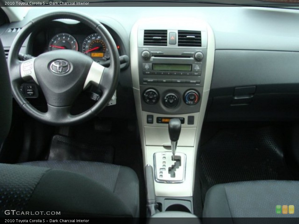 Dark Charcoal Interior Dashboard for the 2010 Toyota Corolla S #64928173