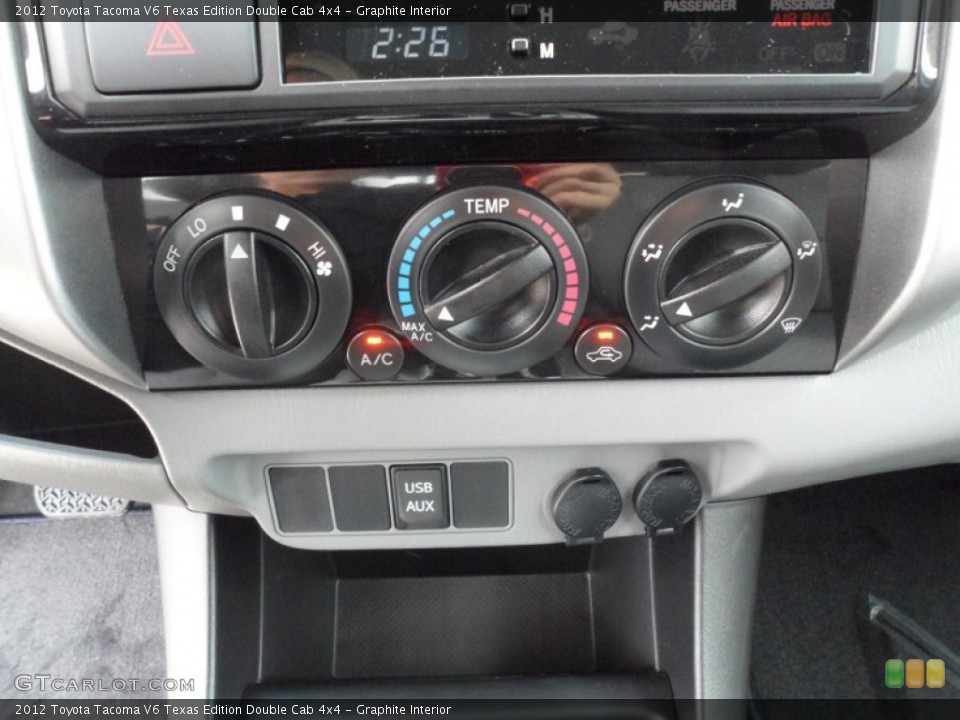 Graphite Interior Controls for the 2012 Toyota Tacoma V6 Texas Edition Double Cab 4x4 #64973713