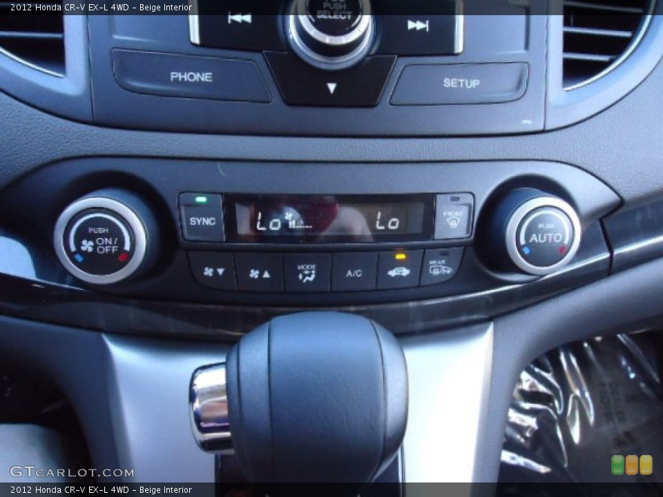 Beige Interior Controls for the 2012 Honda CR-V EX-L 4WD #65050336