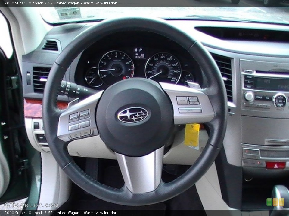 Warm Ivory Interior Steering Wheel for the 2010 Subaru Outback 3.6R Limited Wagon #65329769
