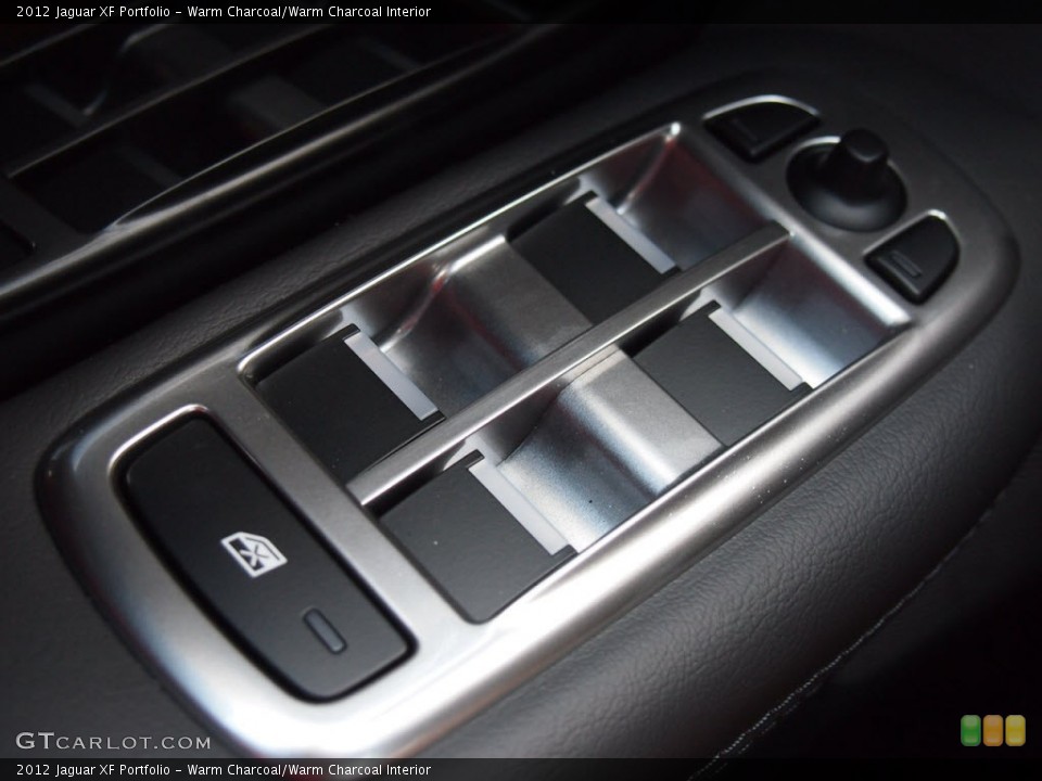 Warm Charcoal/Warm Charcoal Interior Controls for the 2012 Jaguar XF Portfolio #65345676