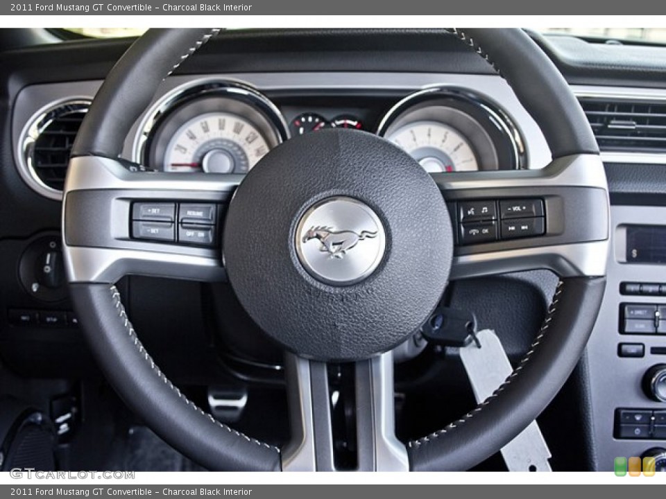 Charcoal Black Interior Steering Wheel for the 2011 Ford Mustang GT Convertible #65376690