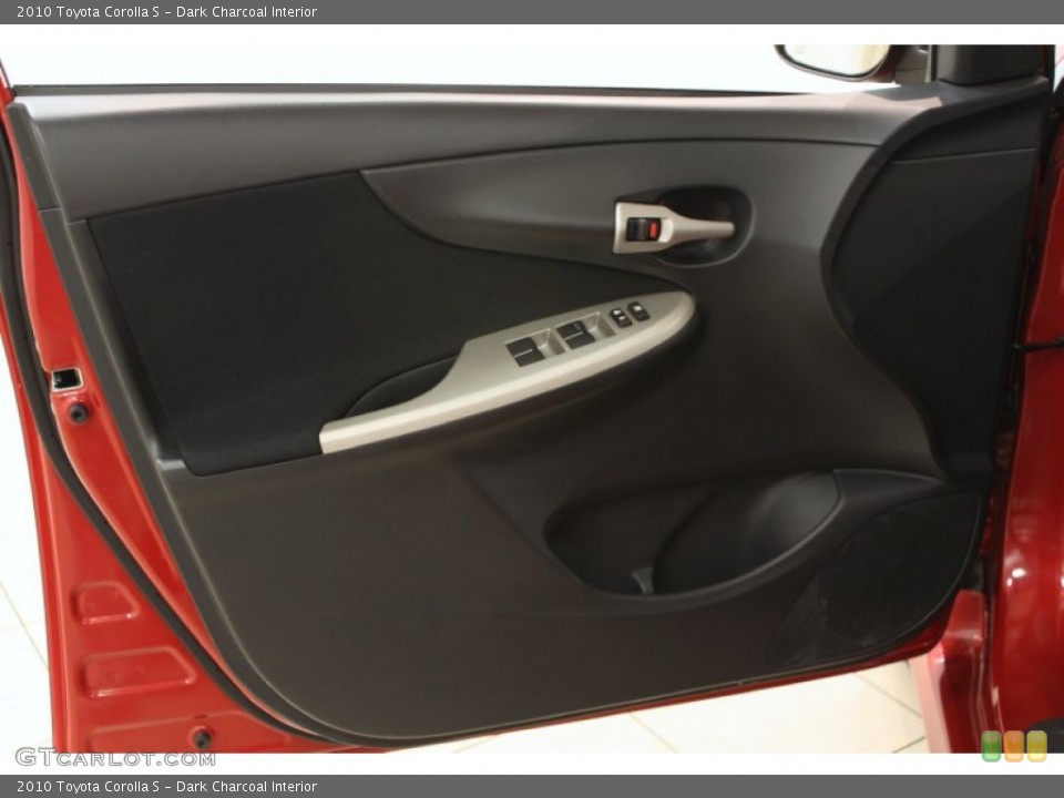 Dark Charcoal Interior Door Panel for the 2010 Toyota Corolla S #65477512
